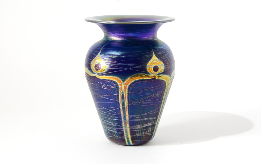 Appraisal: CARL RADKE THREADED ART GLASS VASE Iridescent purple body with