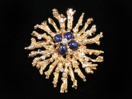 Appraisal: YELLOW GOLD LAPIS LAZULI AND DIAMOND STYLIZED SUNBURST BROOCH s