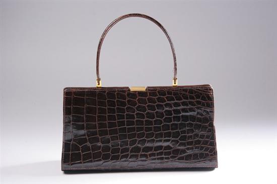 Appraisal: VINTAGE ALLIGATOR PURSE Interior marked Made in France Expressly for