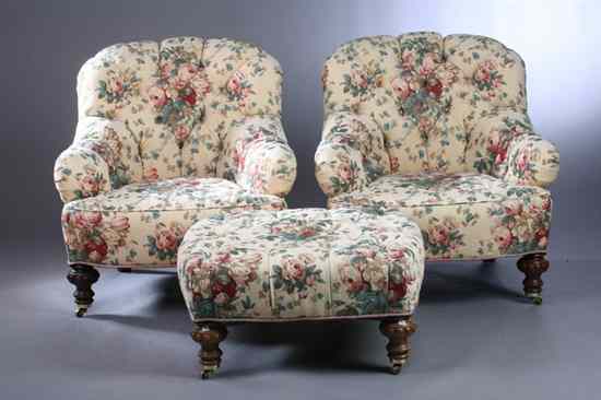 Appraisal: PAIR ENGLISH STYLE UPHOLSTERED CLUB CHAIRS WITH OTTOMAN Button tufted