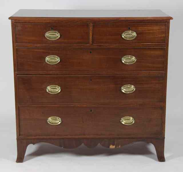 Appraisal: A late Georgian mahogany chest of two short and three