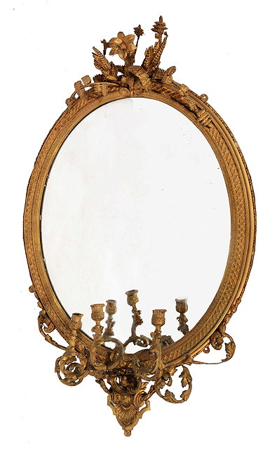 Appraisal: A VICTORIAN GILT GESSO OVAL GIRANDOLE HANGING WALL MIRROR with