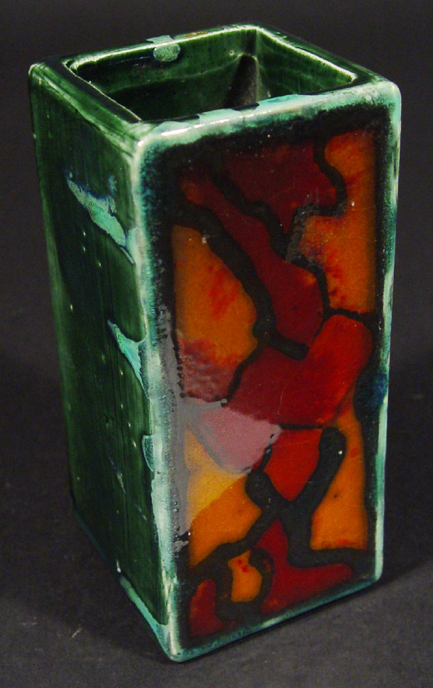 Appraisal: Eric Leaper square based pottery vase decorated in a red