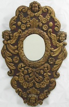 Appraisal: An Ornately Carved Venetian-Style Mirror An ornately carved painted and