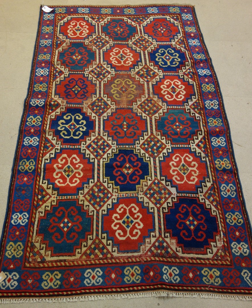 Appraisal: A Moghan rug Caucasian the field filled with inter linking