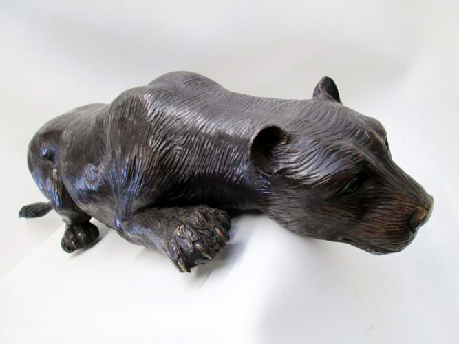 Appraisal: BRONZE WILDLIFE SCULPTURE depicting a mountain lion crouching and peering