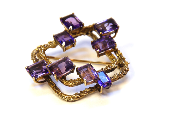 Appraisal: A Gold Amethyst Brooch the custom contemporary design of K