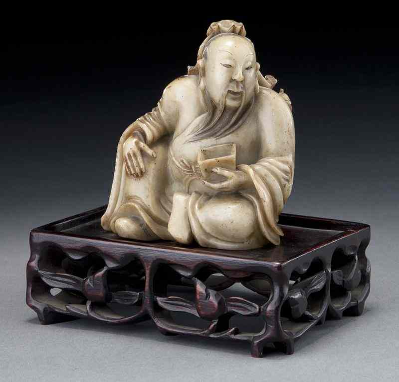 Appraisal: Chinese Qing carved soapstone figuredepicting Li Bo ''H x ''W