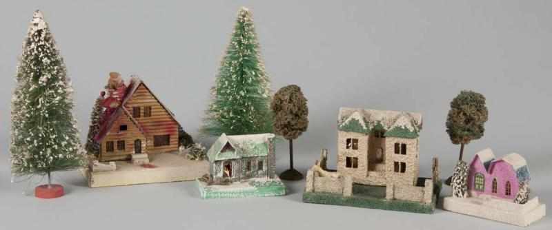 Appraisal: Lot of Christmas Accessories Description Includes two large houses one