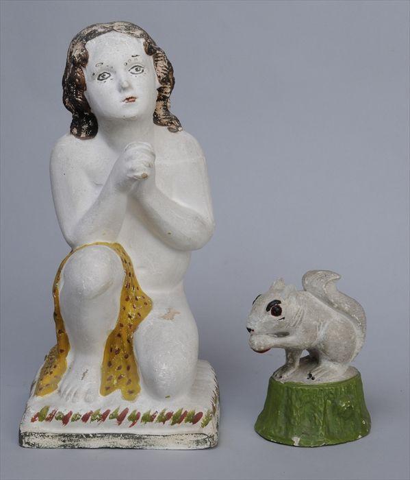 Appraisal: TWO PAINTED CHALKWARE FIGURES The first a girl kneeling and