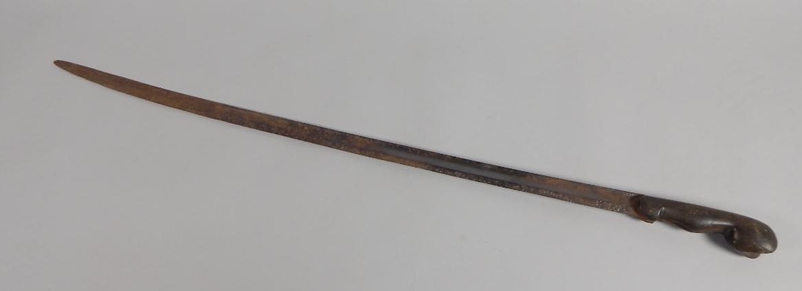 Appraisal: A late thC early thC African sword with an iron