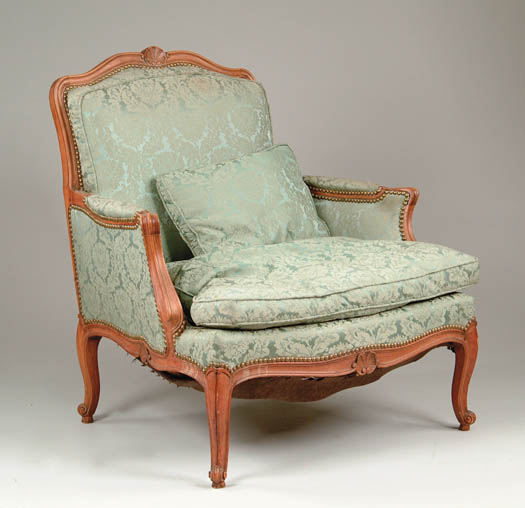 Appraisal: FRENCH STYLE UPHOLSTERED ARMCHAIR Fine quality in French provincial style