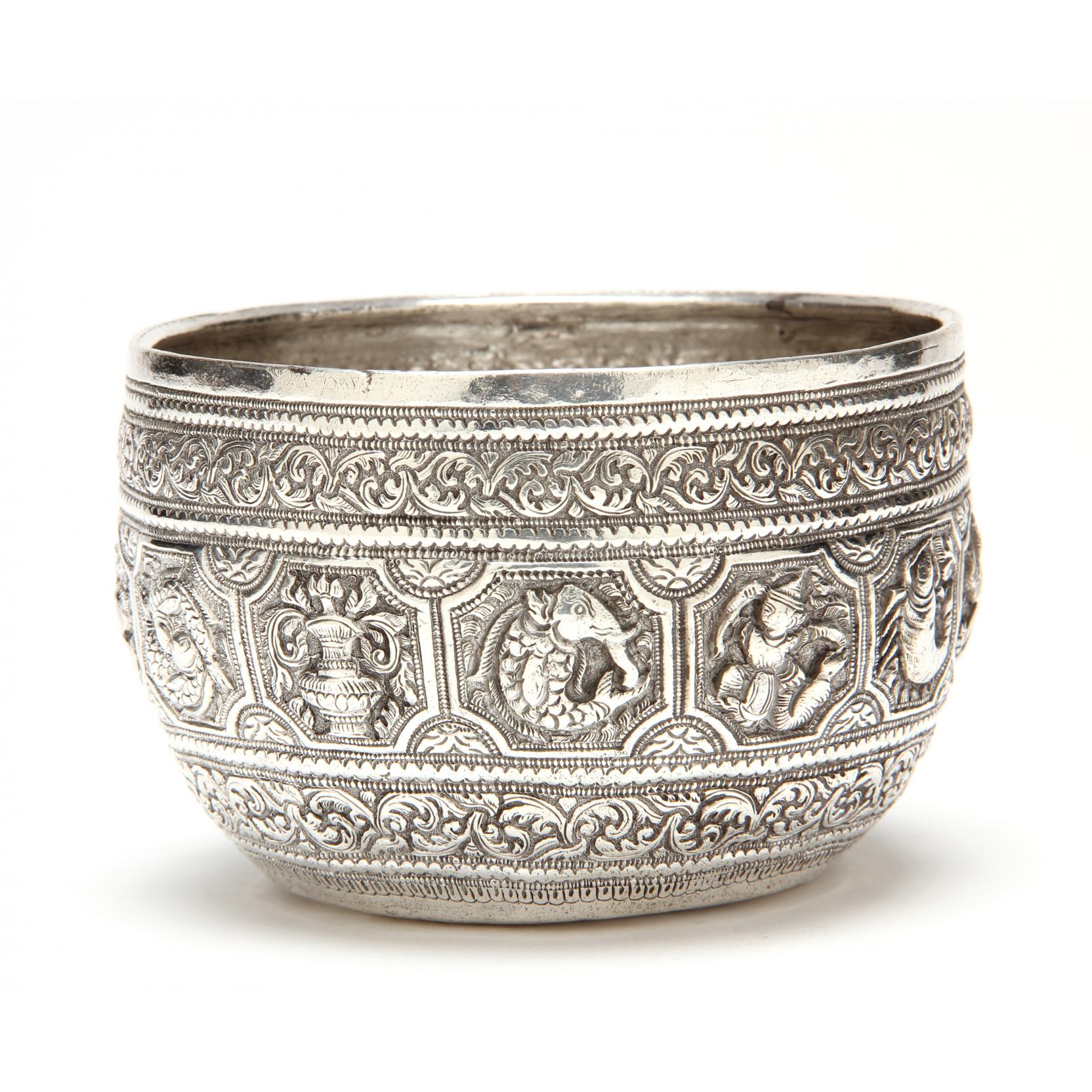 Appraisal: Burmese Silver Repousse Bowl the rounded form with chased band