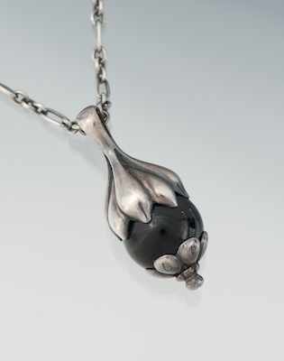 Appraisal: A Georg Jensen Silver and Onyx Pendant on Chain Heritage