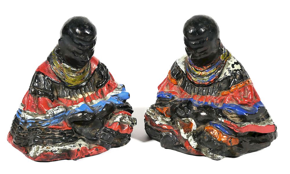 Appraisal: SEMINOLE INDIAN Woman Bookends Pair of cast metal painted bookends