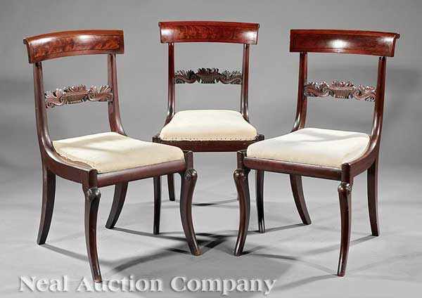 Appraisal: Three Fine American Classical Carved Mahogany Side Chairs early th