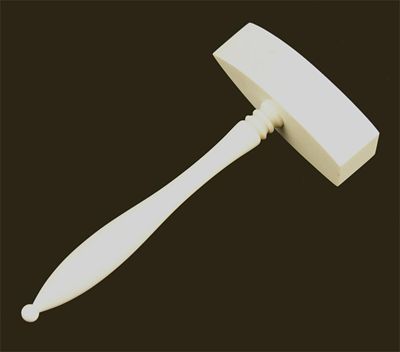 Appraisal: An ivory ceremonial gavel with a turned handle in cm