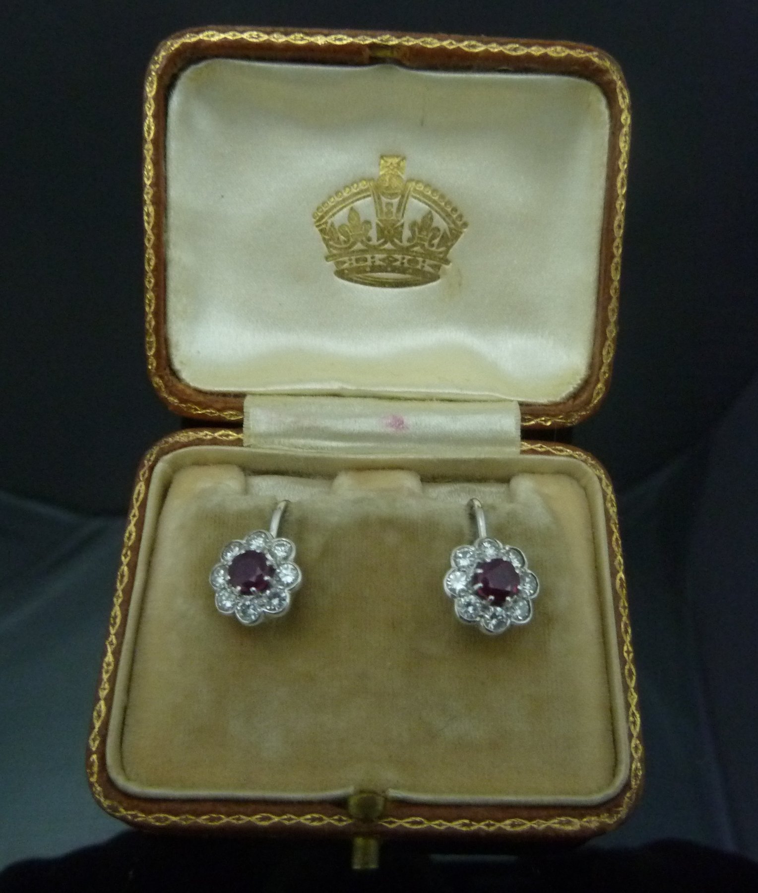 Appraisal: A pair of ruby and diamond cluster earrings the screw