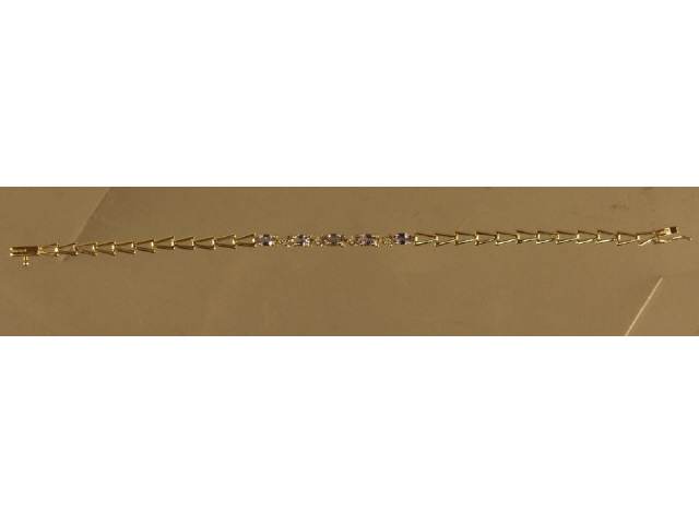 Appraisal: Marvelous ladies karat yellow gold oval tanzanite and diamond bracelet