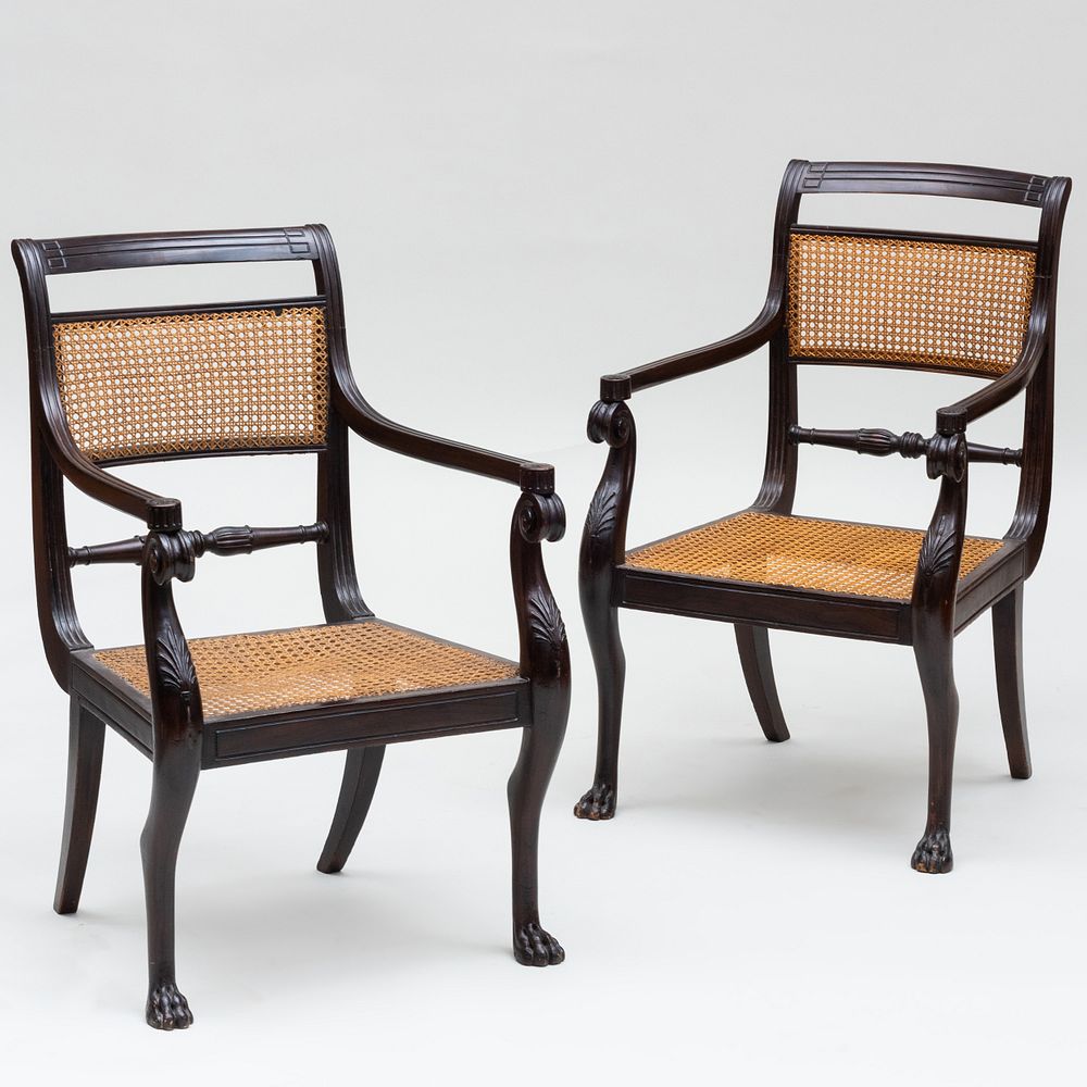 Appraisal: Pair of Regency Faux Painted Rosewood and Caned Armchairs Each