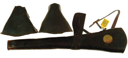 Appraisal: UNIDENTIFIED CARBINE SCABBARD AND STIRRUPS brown leather scabbard has a