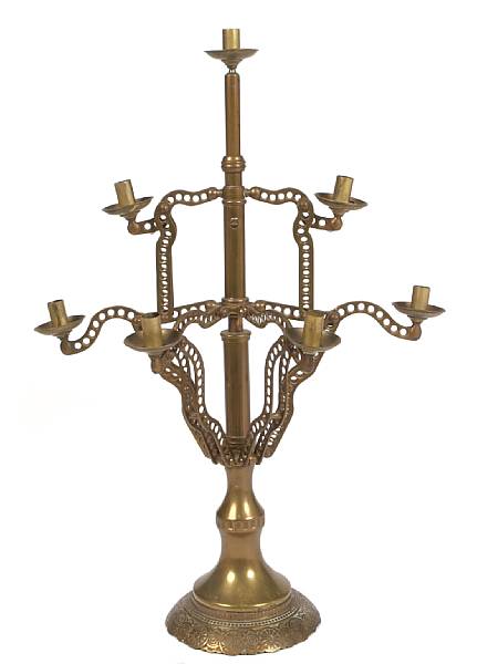 Appraisal: A Gothic Revival brass seven light candelabrum height in width