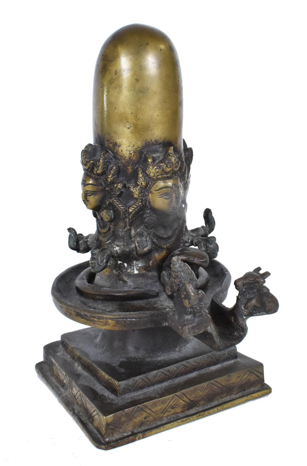 Appraisal: INDIAN BRONZE SHIVA LINGUMFour depictions of Shiva his hands with