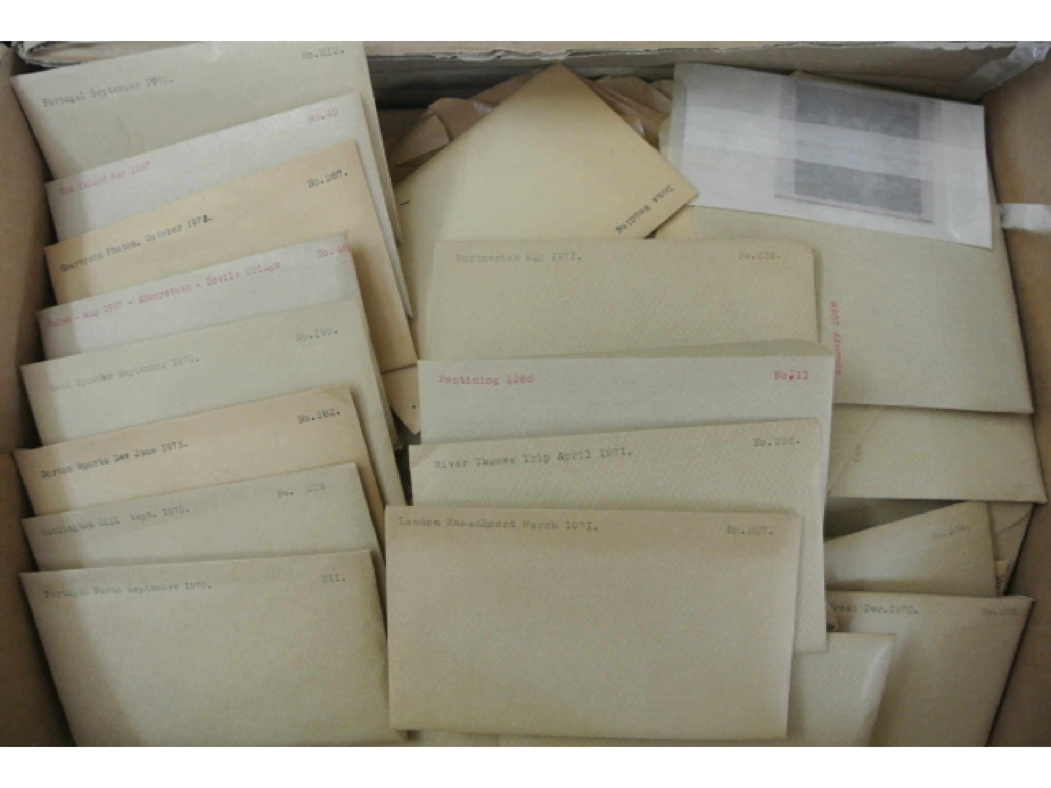 Appraisal: A quantity of photographic negatives in envelopes and labelled i