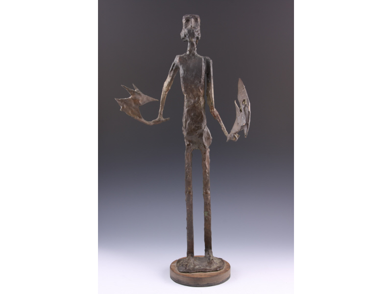 Appraisal: Modern Metal Statuette of a man holding two indistinguishable items