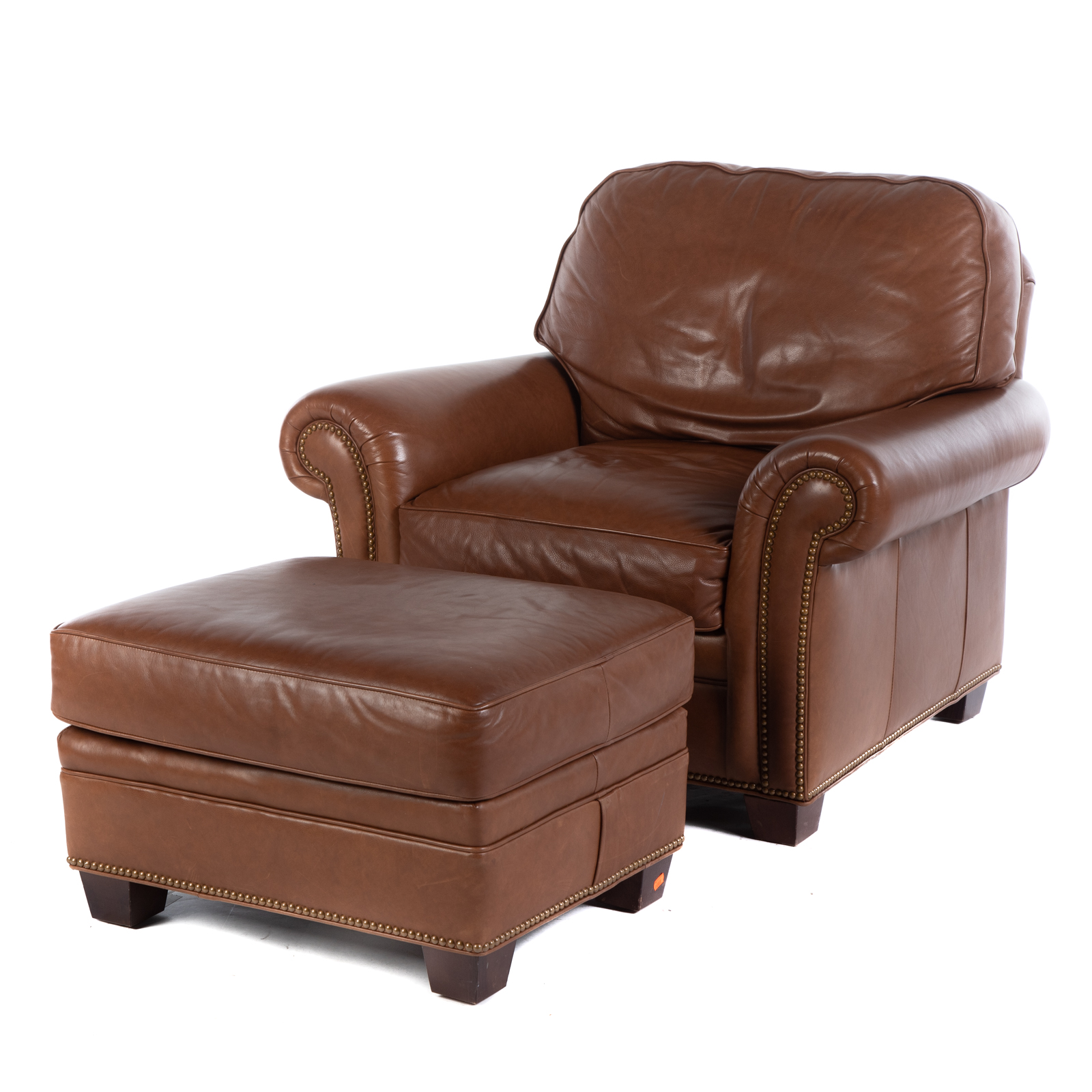 Appraisal: HANCOCK MOORE LEATHER CHAIR OTTOMAN Chair in H in W