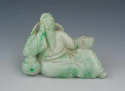 Appraisal: A Reclining Jadeite Lipo Figure Light green and mint colored