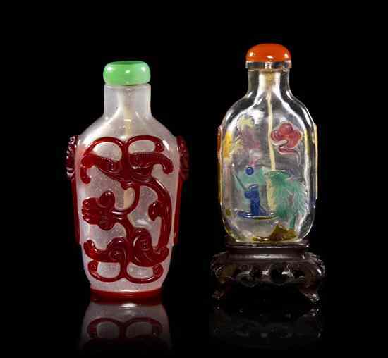 Appraisal: A Group of Two Overlay Glass Snuff Bottles the first