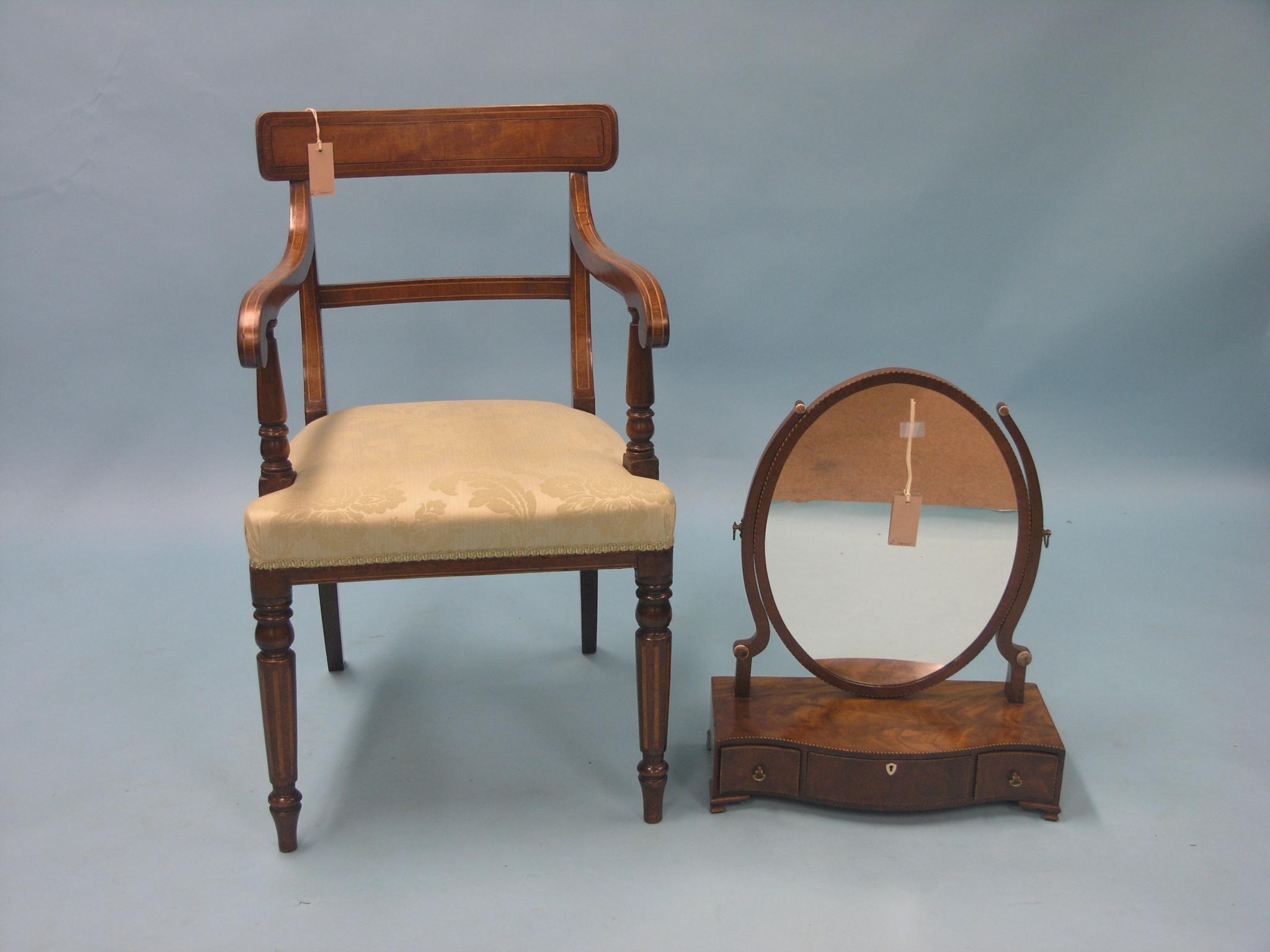 Appraisal: A Georgian-style mahogany toilet mirror oval plate adjustable on serpentine-shaped