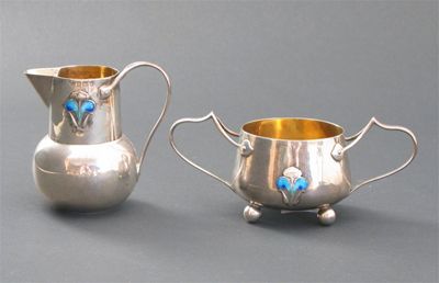 Appraisal: A James Fenton silver and enamel milk-jug and sugar basin