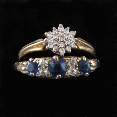 Appraisal: A diamond and sapphire seven stone ring and a diamond