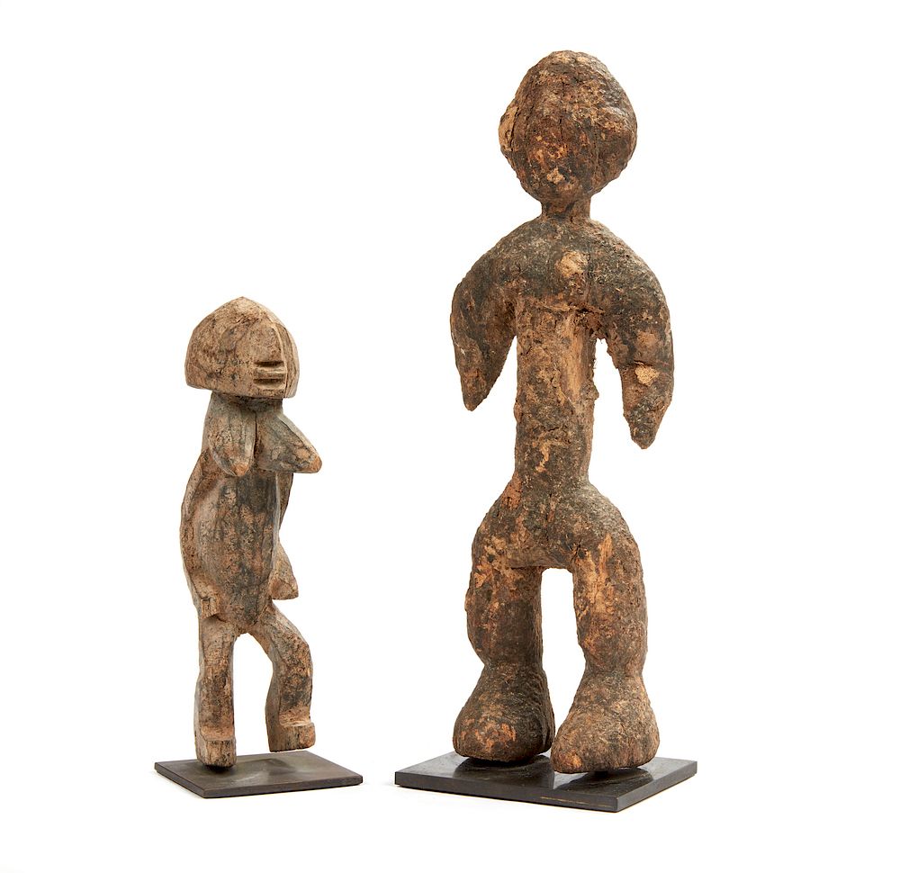 Appraisal: African Female and Male Wood Figures African male and female