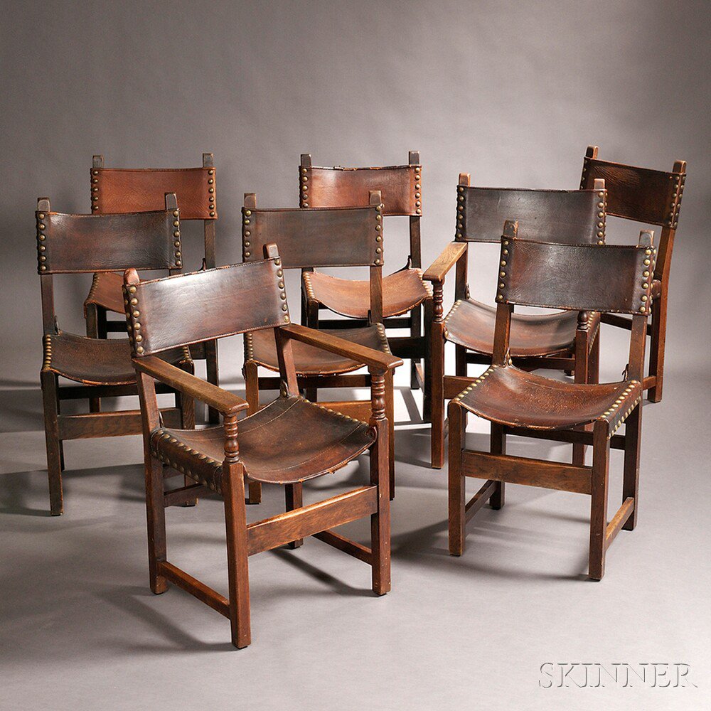 Appraisal: Eight Arts Crafts Frailero-style Chairs Oak leather brass c Each