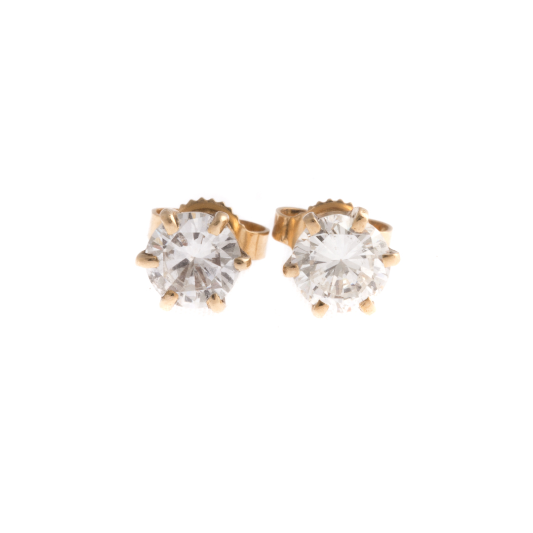 Appraisal: A Pair of Lady's Diamond Solitaire Earrings K yellow gold