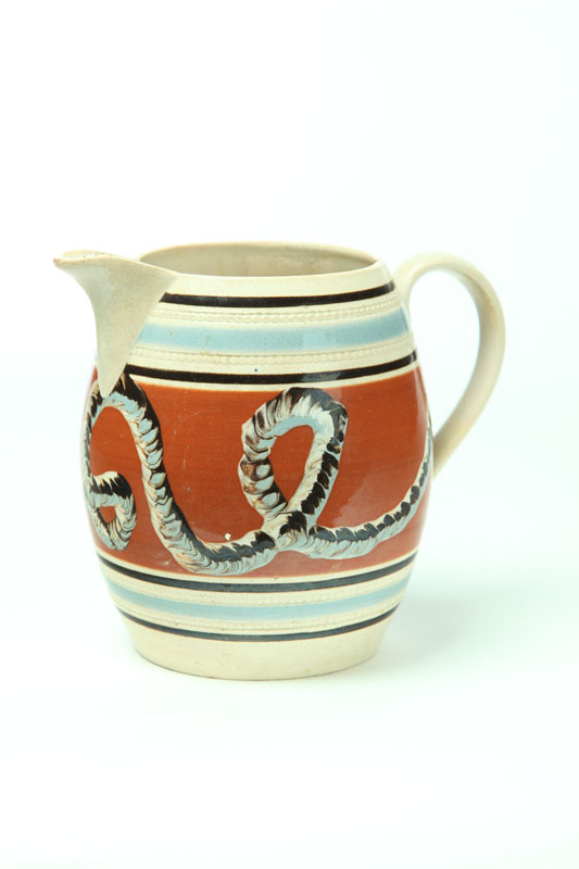 Appraisal: MOCHA PITCHER England st quarter- th century Earthworm on brown