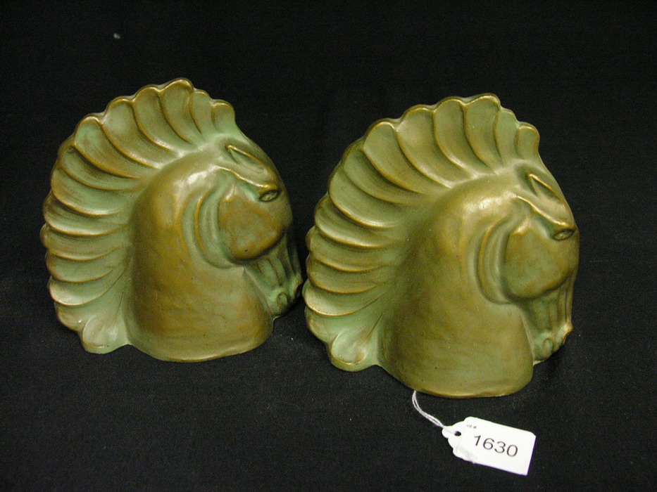 Appraisal: DECO METAL HORSE HEAD BOOKENDS Marked Sculptors Metal Guild A