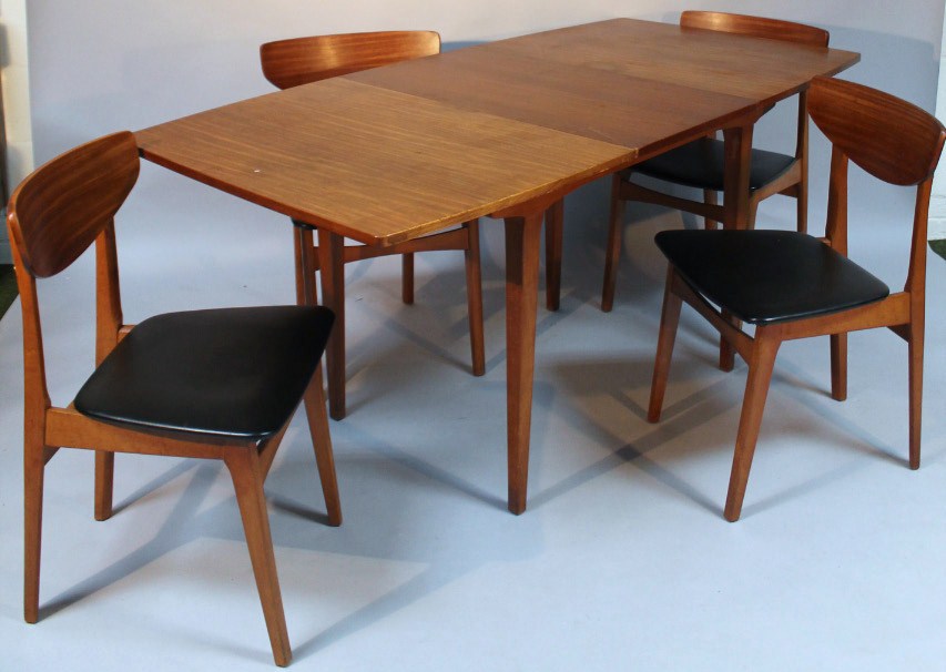 Appraisal: A 's G-plan style draw leaf table and four chairs