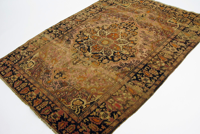 Appraisal: ANTIQUE PERSIAN SAROUK AREA RUG traditional design with abrash ft