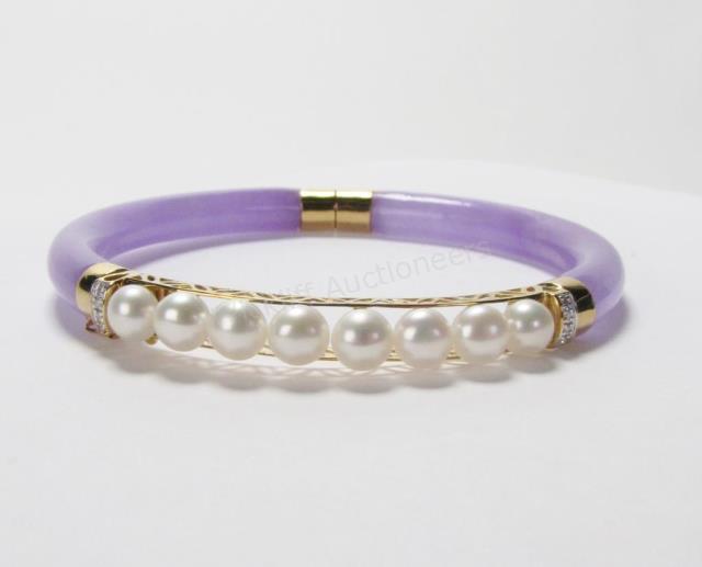 Appraisal: A K yellow gold purple jade bangle bracelet with eight