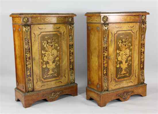 Appraisal: A pair of Victorian ormolu mounted and marquetry inlaid walnut