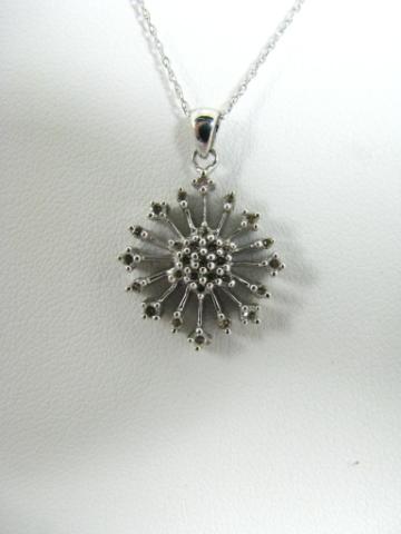 Appraisal: K white gold diamond star burst pendant on '' K