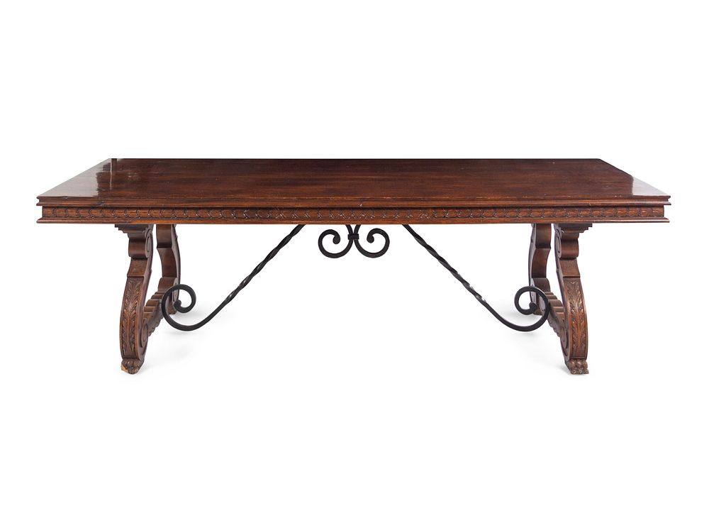 Appraisal: A Spanish Baroque Style Iron-Mounted Walnut and Elm Trestle Table