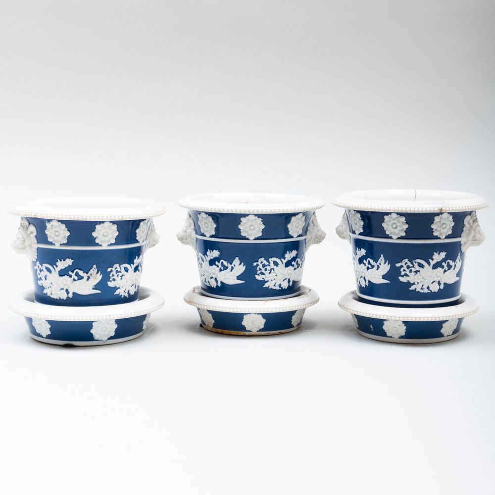 Appraisal: Set of Three English Blue Ground Porcelain Cache Pots and