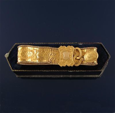 Appraisal: A th century French gold strap bracelet with slide Damaged