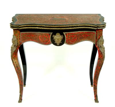 Appraisal: A LOUIS XIV STYLE RED BOULLE AND EBONISED FOLDING CARD