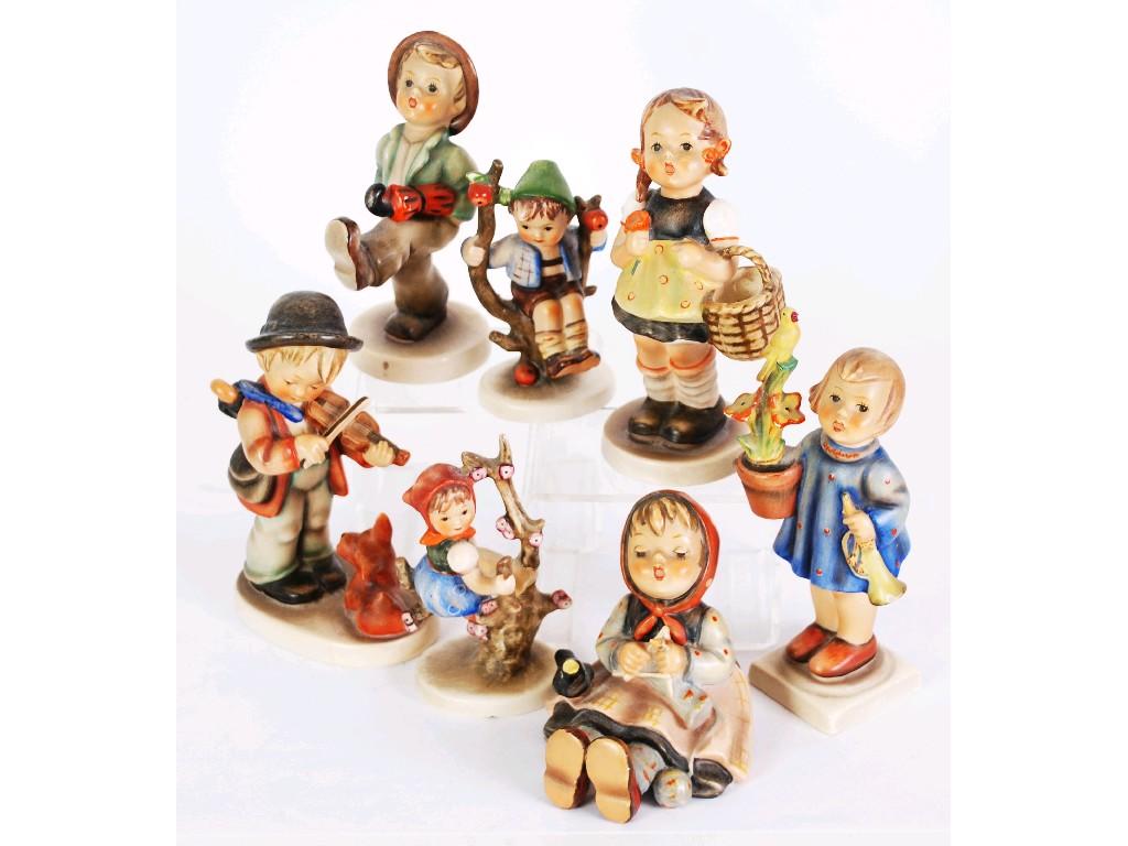 Appraisal: SEVEN W GOEBEL HUMMEL FIGURINES EST -